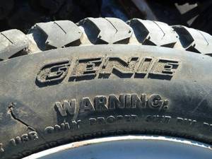 lot 93 image: Genie Lift Solid Tire Set