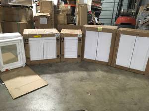 Lot of assorted Cabinets various models and conditions customer returns see pictures
