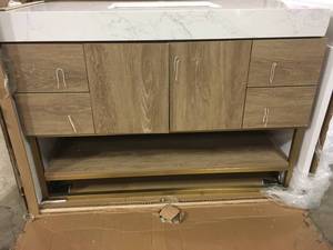 Roswell Alistair 48 in. Bath Vanity in North American Oak with Grain Stone Top in White with White Basin damaged on the side see pictures
