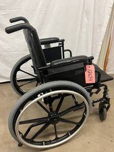 lot 34 image: MSRP $600 Invacare 9000xt Lightweight Collapsible 19 Seat Wheelchair - Good Condition One Arm Has Wear