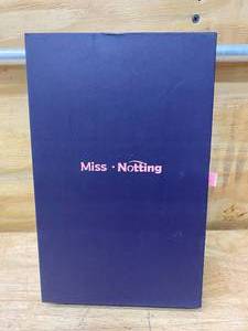 lot 64 image: MISS NOTTING 12 Pastel Wavy Dark Brown Natural Looking Wig