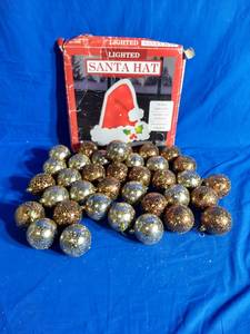 lot 52 image: Lighted Santa Hat and Christmas Ornaments