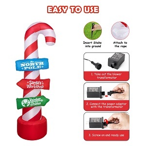 lot 93 image: Hoojo 8 Foot Inflatable Candy Cane Display