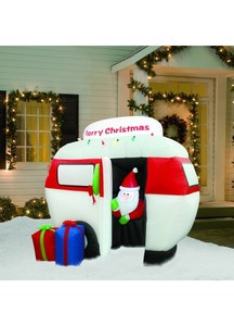 lot 98 image: 6.5 Foot Long Christmas Inflatable Camper with Santa (Tested and Working)