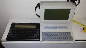(2) Tandy Word processor and Zenith Lunch Box Computer.