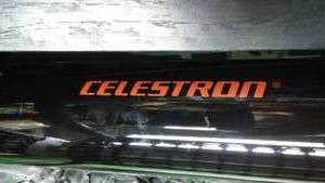 Celestron Telescope with tripod.
