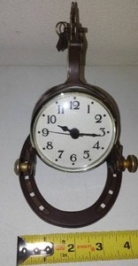 Spur and horseshoe clock � Western theme