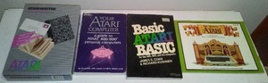 (4) Collectible Atari Books And Cartridge