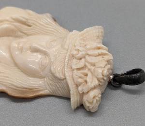 Carved Bone Woman Pendant