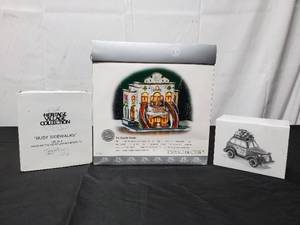 lot 54 image: Lot Of Department 56 Holiday Village Accessories - Include The Majestic Theater, City Taxi, & Busy Sidewalks