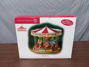 lot 2 image: Department 56 Carnival Christmas Village Accessories The Red Ruby Carousel