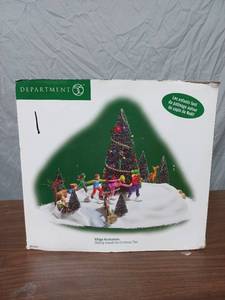 lot 9 image: Department 56 Christmas Village Animated Skating Around the Christmas Tree.