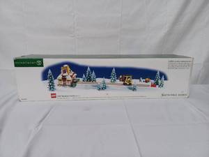 lot 24 image: Department 56 North Pole Series Lego Warehouse Forklift Set (No Power)
