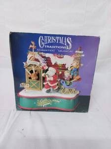 lot 28 image: Christmas Traditions Animated Musical Dcor Piece