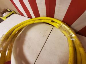 lot 26 image: Two pieces of 12 gas line, approx. 25ft