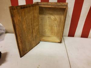lot 82 image: Decrotive  wood book with cross on lid.
