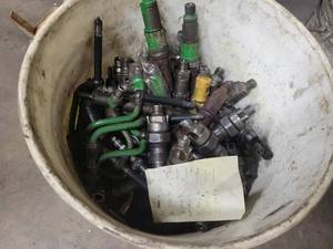 lot 179 image: 5-Gallon Bucket of Assorted Diesel Injectors