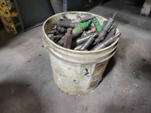 lot 180 image: 2-Gallon Bucket of Assorted Diesel Injectors