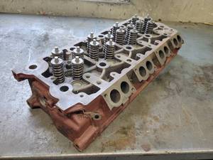 lot 203 image: International MAXXFORCE 7 Engine Cylinder Head - Part No. 1832135M2 - Unknown Condition