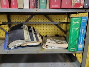 lot 112 image: Shelf of Assorted Manuals