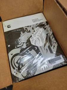 lot 113 image: (4) Boxes of Sealed Manuals