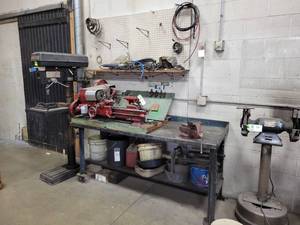 lot 275 image: Steel Worktable w Craftsman 4 Bench Vise - Table is Approx. 72 x 28 x 34  Contents of Upper Shelf and Pegboard