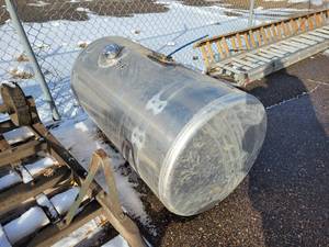 lot 26 image: Aluminum Freightliner Saddle Diesel Tank - Approx. 47 Long x 25 Diameter - Includes Cap