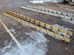 lot 297 image: 14 Aluminum Extension Ladder - Yellow