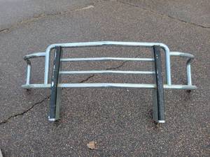 lot 248 image: GO Industries Chrome Grill Guard - Approx 76 Inside Wide x 31 tall, Mounts are 41 On Center - Marked #644