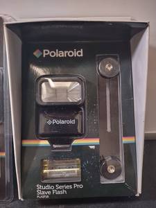 lot 15 image: BRAND NEW Polaroid 5 Piece Camera Cleaning Kit & Studio Series Pro Slave Flash Kit