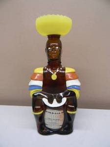 lot 27 image: VINTAGE 1970s - OLD OAK RUM LIMBO DRUMMER LIQUOR BOTTLE  DECANTER WITH HAT - AWESOME DISPLAY PIECE - APPROX 12 - SEE PICTURES