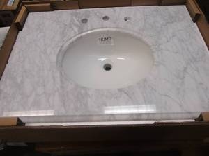 lot 307 image: Home Decorators Collection 31 in. W Marble Vanity Top in Carrara with White Basin (NEW IN BOX)
