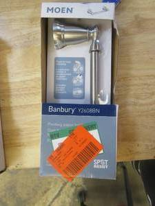 lot 438 image: MOEN Banbury Pivoting Double Post Toilet Paper Holder in Spot Resist Brushed Nickel