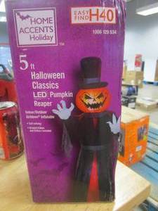 lot 369 image: Home Accents Holiday 5 ft Jack-O-Lantern Head Reaper Halloween Inflatable (OPEN BOX)