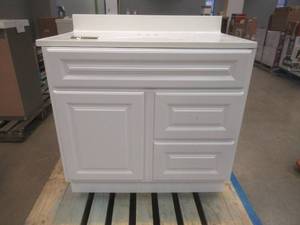 lot 109 image: Glacier Bay 36.5 in. W x 18.68 in. D x 35.36 in. H Bath Vanity in White with Cultured Marble Vanity Top in White with White Basin, Crack on LH SIDE BOTTOM - SOLD AS IS