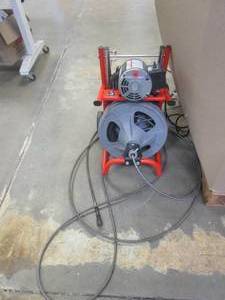 lot 473 image: RIDGID K-400 Drain Cleaning Snake Auger 120-Volt Drum Machine with C-32IW 38 in. x 75 ft. Cable (CABLE IS TANGLED)