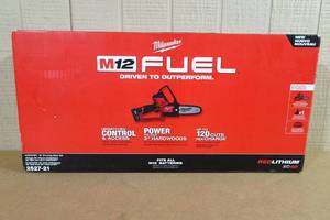 lot 1 image: Milwaukee M12 Fuel Hatchet 6 Pruning Saw Kit