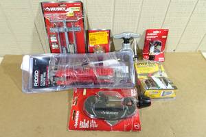 lot 33 image: Assorted Husky and Ridgid Tools- Screw Remover Kit, Pipe Cutter, Faucet Tool, Sleeve Puller
