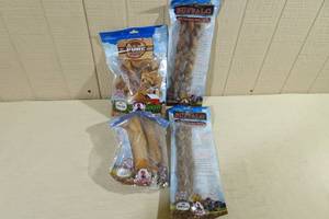 lot 73 image: Pure Buffalo Dog Treats -Meaty Bone, Pig Ear Strips, Braided Bully Sticks