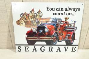 lot 82 image: Seagrave Fire Truck Metal Sign