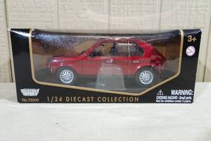 lot 94 image: Motor Max 1985 Plymouth Horizon 124 Scale Diecast Car