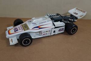 lot 207 image: Vintage 1975 Jim Beam Whiskey Race Car Decanter - Bobby Unser