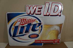 lot 216 image: Miller Lite Embossed Metal Bar Sign