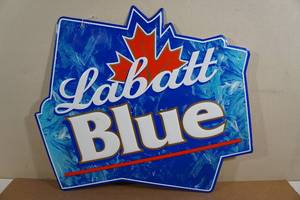 lot 221 image: Labatt Blue Beer Embossed Metal Bar Sign