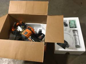 lot 31 image: Ridgid 10 in. Dual Bevel Sliding Miter Saw open box customer return see pictures