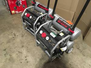 lot 11 image: Lot of 2 Husky  4.5 Gal. Portable Electric-Powered Silent Air Compressor various conditions Customer Returns See Pictures