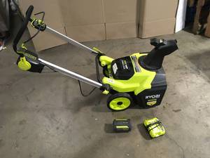 lot 26 image: Ryobi 40V HP Brushless 18 in. Single-Stage Cordless Electric Snow Blower with  Battery and Charger open customer return see pictures