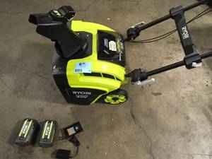 lot 28 image: Ryobi 40V HP Brushless 21 in. Cordless Single Stage Snow Thrower with (2)  Batteries and Chargercustomer returns review pictures