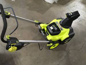 lot 36 image: Ryobi 40V HP Brushless Whisper Series 21 in. Single-Stage Cordless Battery Snow Blower with 1 battery and charger customer return see pictures