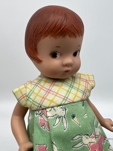 lot 1092 image: Effanbee Doll with Beatrix Potter Books and Figurines